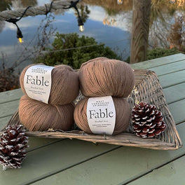Betwixtmas 2025 Knitted Cabled Shawl - Faun in West Yorkshire Spinners Fable Brushed Aran by Sarah Hatton