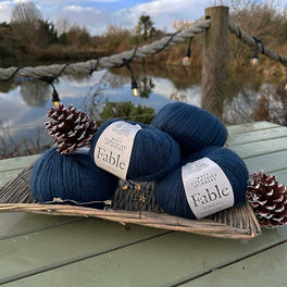 Betwixtmas 2025 Knitted Cabled Shawl - Fjord in West Yorkshire Spinners Fable Brushed Aran by Sarah Hatton